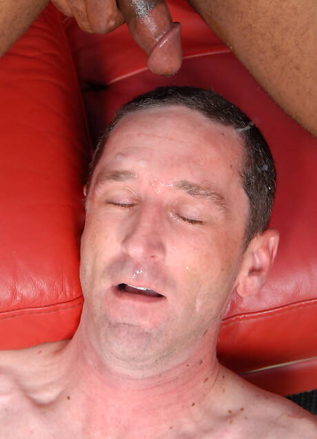 Beefcake Jackson Scott and black well-built Mr Darvin in hot interracial anal sex