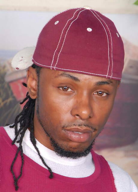 Black beefcake Mr Darvin and stud Tyler Ray in black on white anal sex