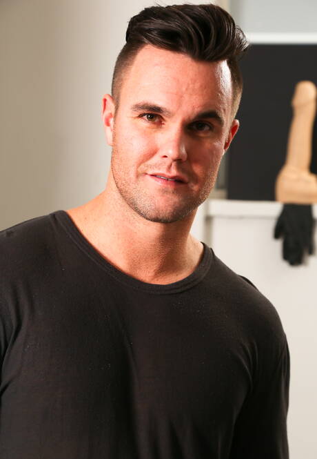 Black strongman Trent King and canadian stud Beau Reed in interracial cock sucking scene