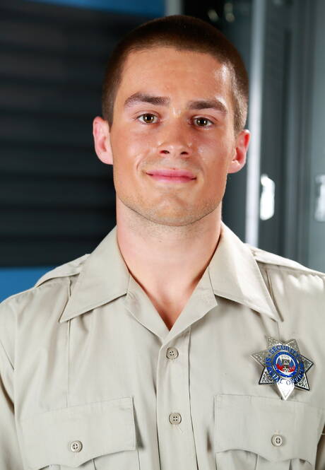 Strongman Jordan Evans posing nude and showing his butt