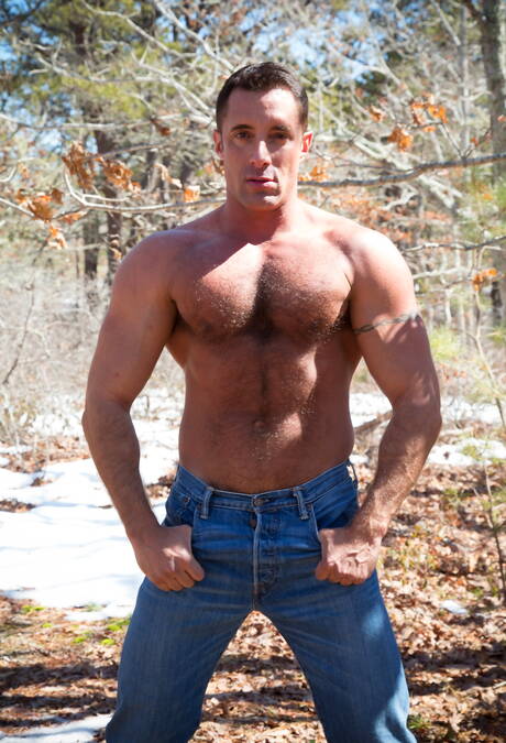 American muscular Nick Capra undressing outdoor