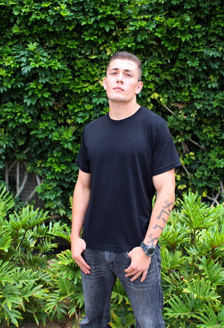 Husky guy Luke Thomas posing nude outside