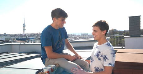 Two czech boys strongman Kirk Gauguin and young Justin Saradon love each other outdoor