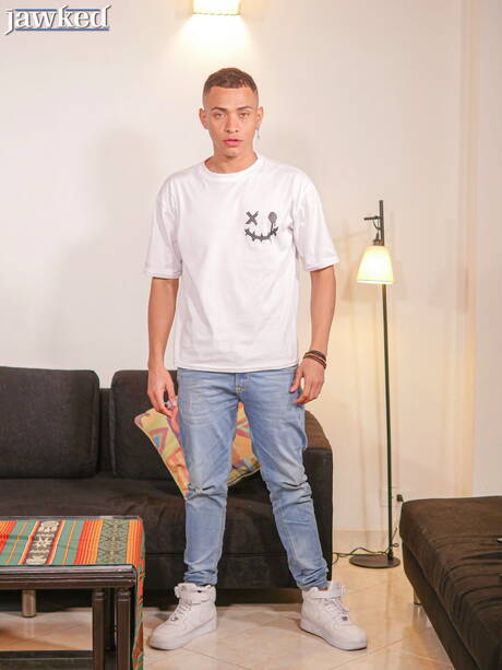 Well-built Tommy Perez posing naked